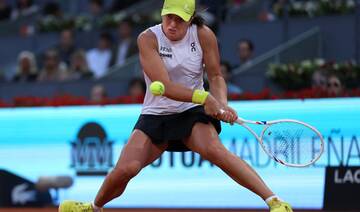 Iga Swiatek reaches Madrid Open quarterfinals after ‘relaxed’ day during blackout