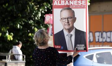 Australians vote in national election with their sights on Trump, living costs