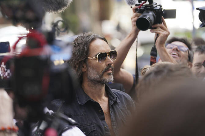UK comedian Russell Brand appears in court on rape charges