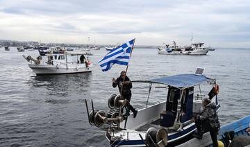 Woman dies when a bomb she is carrying explodes in the Greek city of Thessaloniki, police say