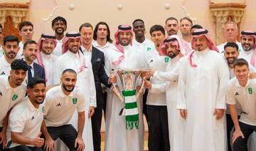 Saudi Crown Prince in a photo with Al-Ahli players. SPA